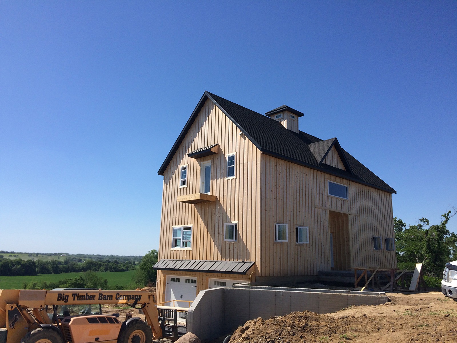iron-horse-barn-under-construction-big-timber-barns Open Concept Barn
